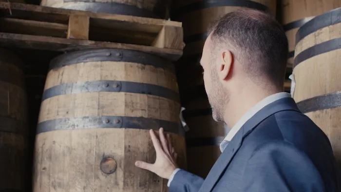 Barrels aging in a rickhouse